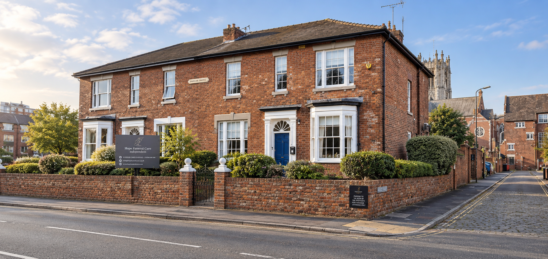 Hope Funeral Care’s red-brick home on Church Street, Southport, with its sign and blue front door