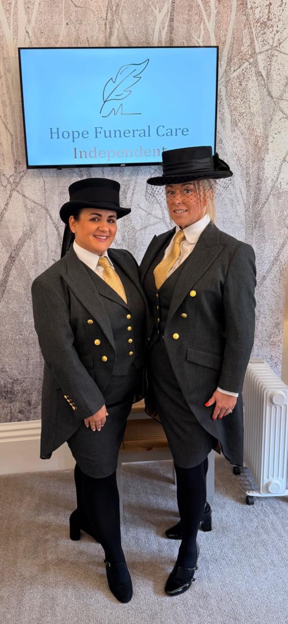 Claire and Wendy of Hope Funeral Care in top hats and funeral dress