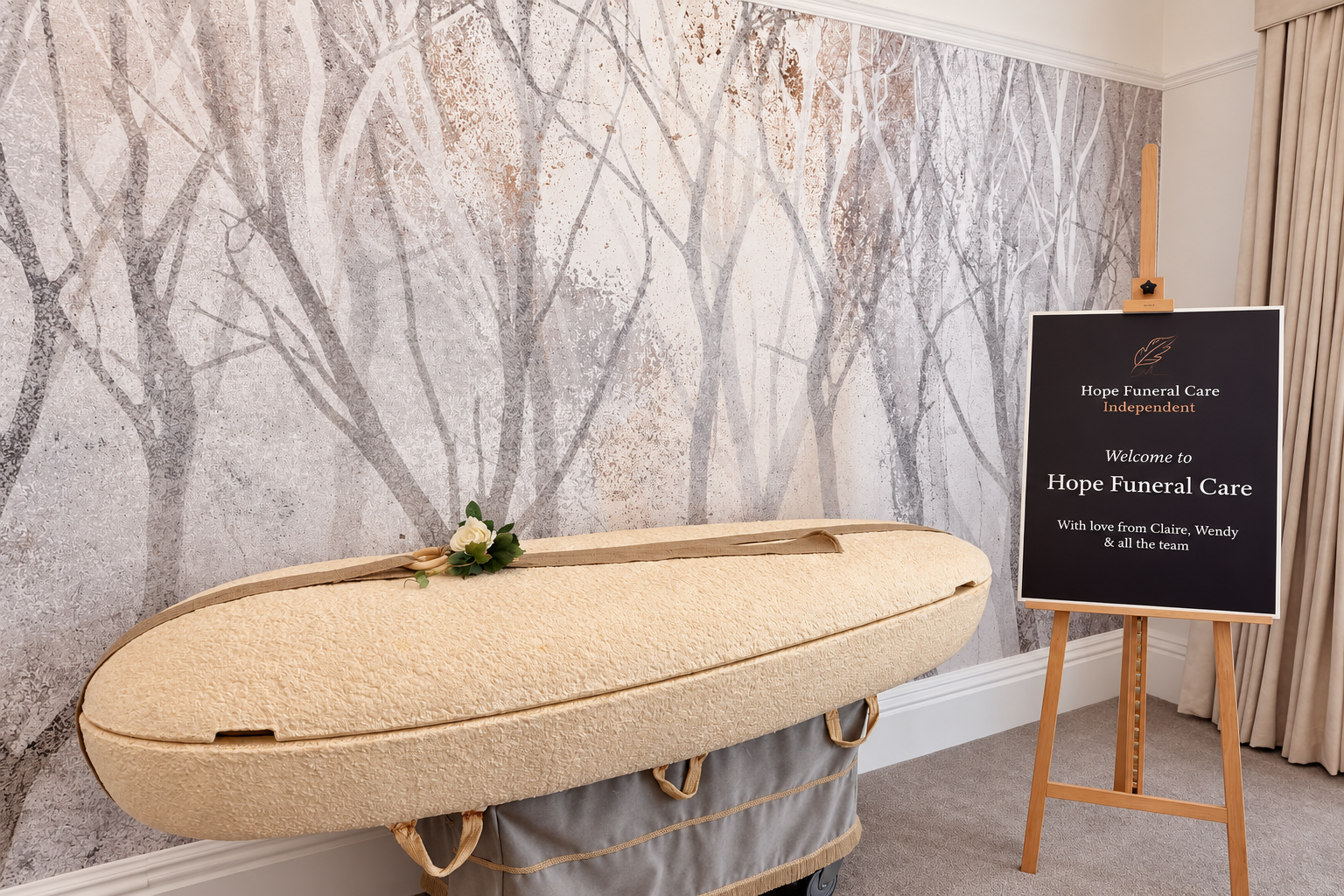 A pale textured eco coffin displayed inside Hope Funeral Care